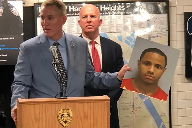NYPD Chief of Detectives Dermot Shea holds up a photo of Drayton last week